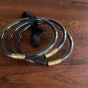 plastic fashionable black/gold bracelets